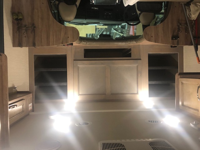 Cabinet door for TV over the cab